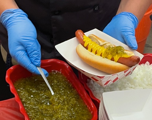 Close up of relish being served with a hot dog