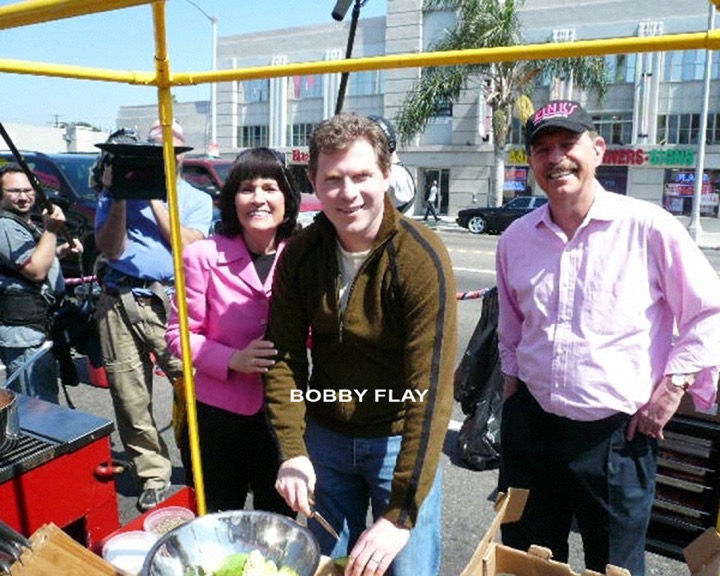 Bobby Flay cooks at Pink's Hot Dogs