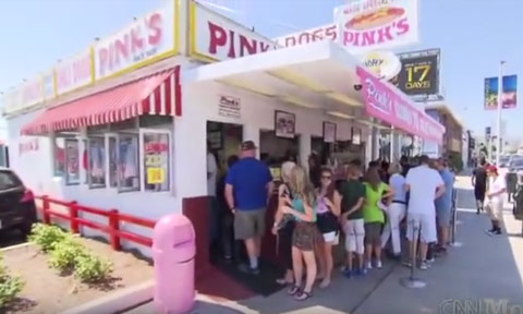 Long lines of people in front of Pink's Hot Dogs