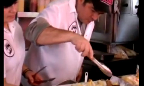 Emeril Lagasse making his signature hot dog at Pink's in Hollywood