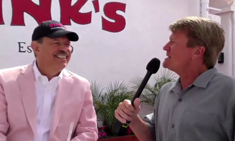 Peter Dills and Richard Pink in front of Pink's Hot Dog stand