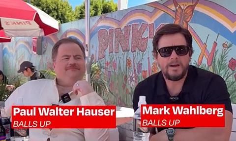 Mark Wahlberg and Paul Walter Hauser have lunch at Pink's Hollywood.